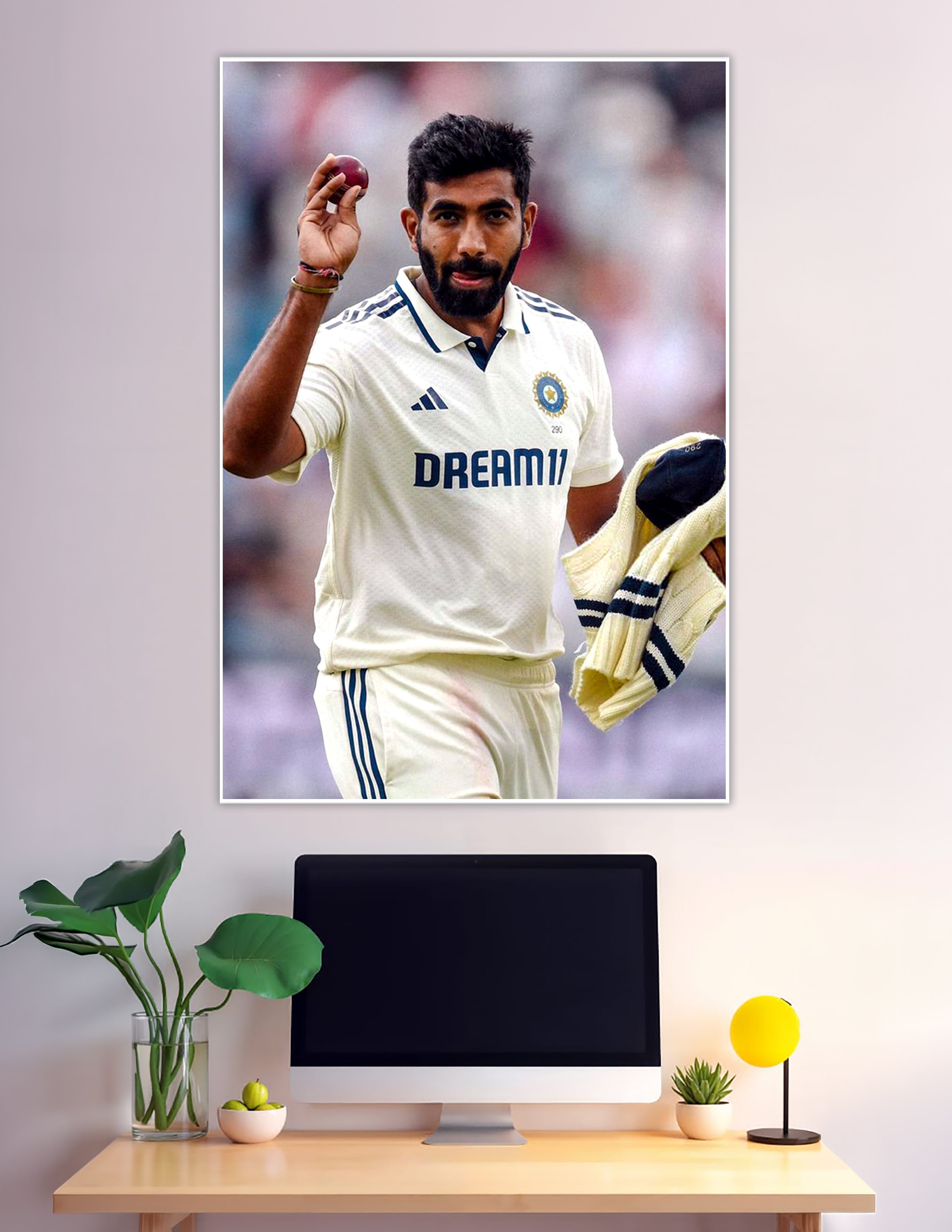 Indian Test cricket fast bowler holding red ball in whites