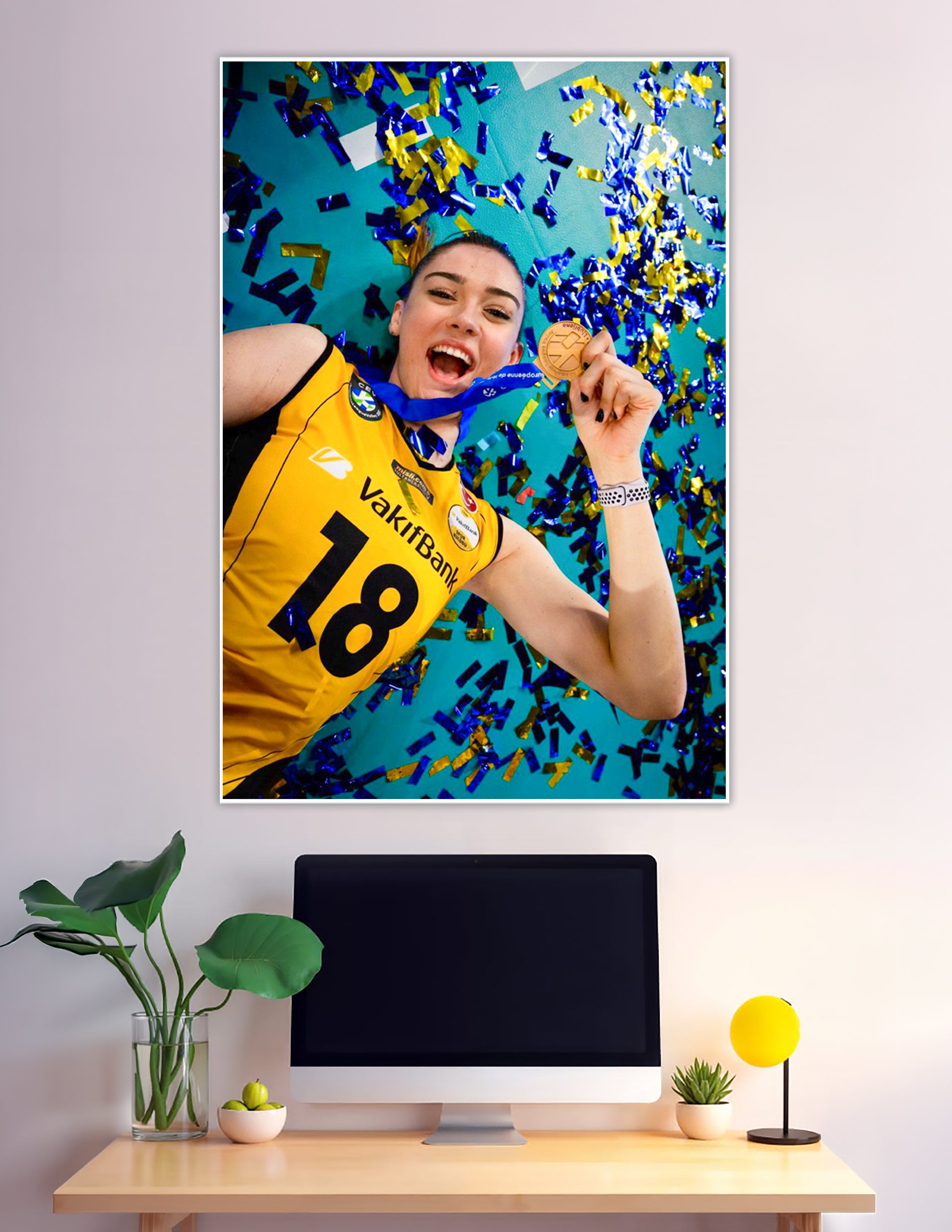 Volleyball player celebrating gold medal with confetti