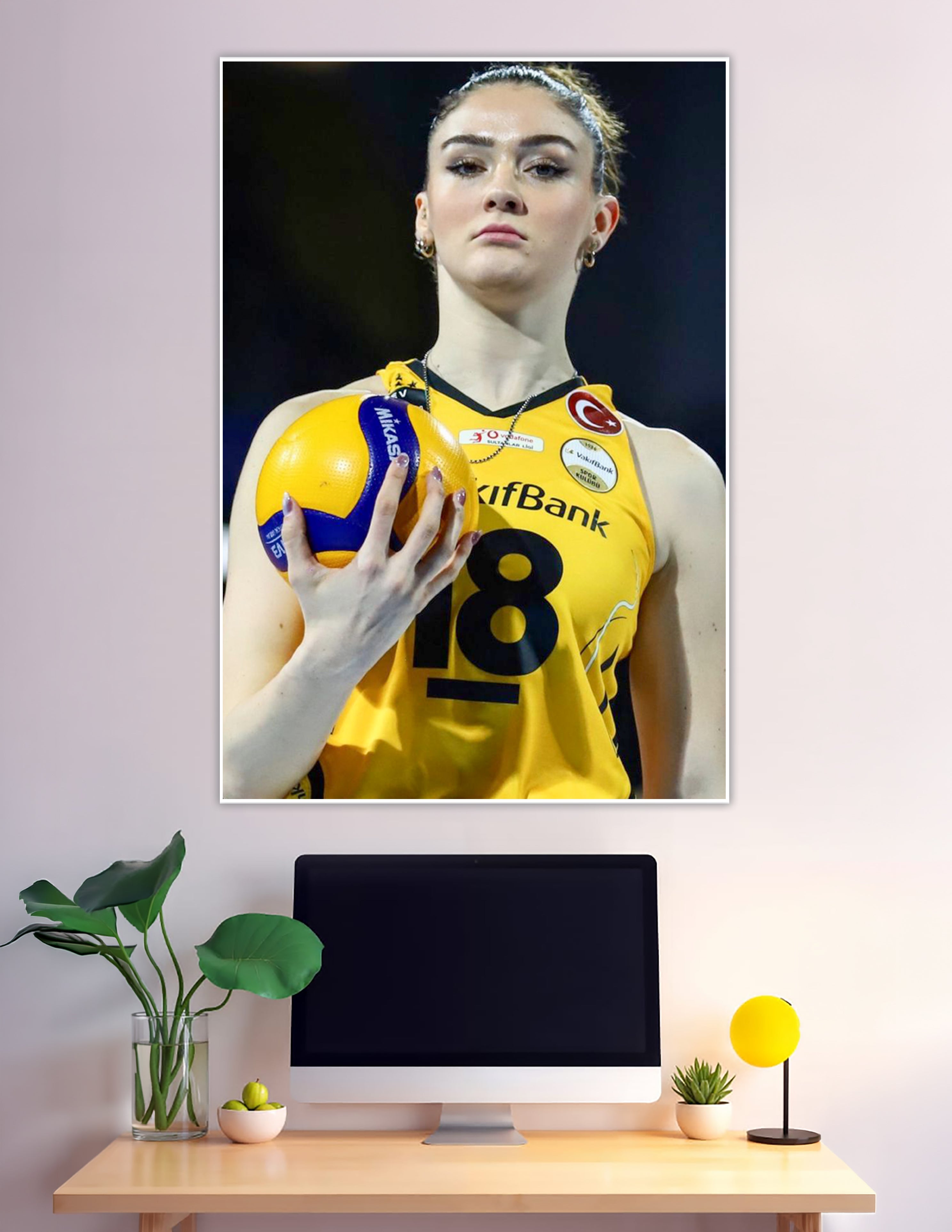 Female volleyball player number 18 VakifBank yellow jersey
