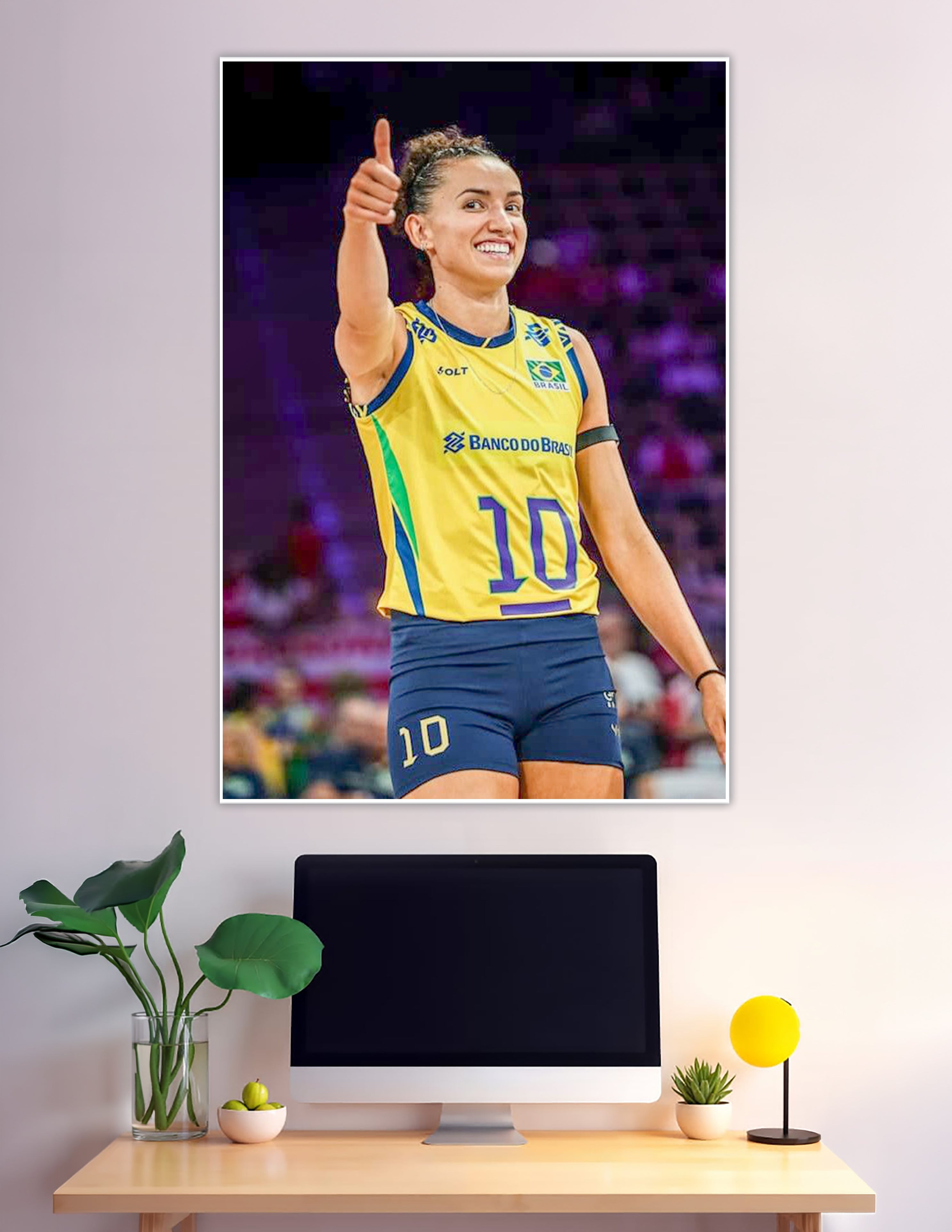 Brazil volleyball player number 10 giving thumbs up smiling